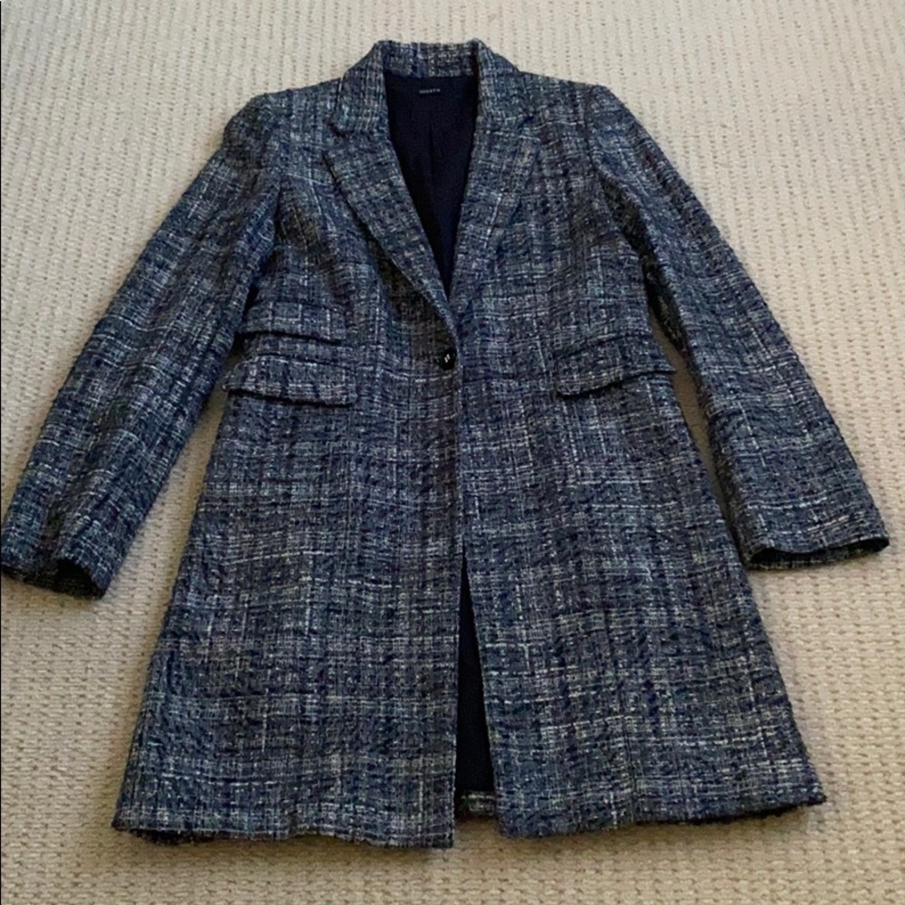 Knee length steel grey overcoat/jacket.